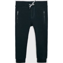 Name it - Spodnie dziecięce 92-152 cm. Szare spodnie chłopięce Name it, bez wzorów, z elastanu. Za 119,90 zł.