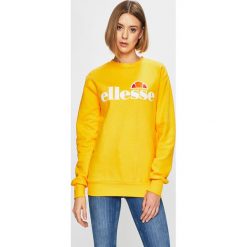 Ellesse - Bluza. Pomarańczowe bluzy damskie Ellesse, z nadrukiem, z bawełny, bez rękawów, bez kaptura. W wyprzedaży za 149,90 zł.