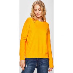 Tommy Jeans - Sweter. Żółte swetry damskie Tommy Jeans, s, bez wzorów, z bawełny, z krótkim rękawem, krótkie, bez kaptura. W wyprzedaży za 249,90 zł.