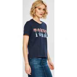 Tommy Jeans - Top. Niebieskie bluzki damskie marki Tommy Jeans, s, z nadrukiem, z bawełny, casualowe, z okrągłym kołnierzem, z krótkim rękawem. W wyprzedaży za 99,90 zł.