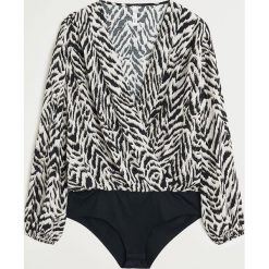 Mango - Bluzka Wild. Czarne bluzki damskie Mango, s, bez wzorów, z elastanu, bez kołnierzyka, z długim rękawem. Za 139,90 zł.