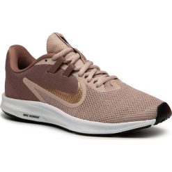 Buty NIKE - Downshifter 9 AQ7486 200 Smoke Mauve/Mtlc Red Bronze. Różowe buty sportowe damskie Nike, bez wzorów, z tworzywa sztucznego, sportowe, do biegania, nike downshifter. Za 249,00 zł.