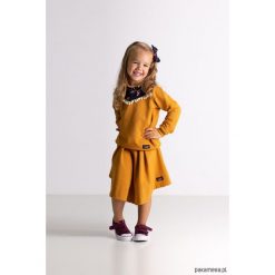 Musztardowa dziewczęca spódnica z zakładkami. Szare spódniczki dziewczęce marki Pakamera, krótkie, mini. Za 79,00 zł.