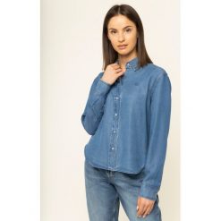 Koszula Calvin Klein Jeans J20J212887. Niebieskie bluzki damskie Calvin Klein Jeans, xs, bez wzorów, z lyocellu, bez kołnierzyka, bez rękawów. W wyprzedaży za 249,00 zł.