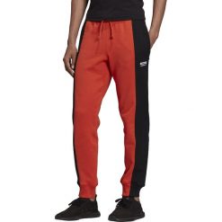 MĘSKIE SPODNIE DRESOWE ADIDAS ORIGINALS (M). Spodnie męskie Adidas, m, bez wzorów, z dresówki. W wyprzedaży za 228,99 zł.