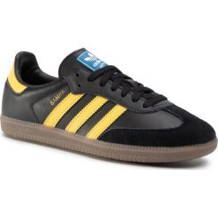 Buty adidas - Samba Og EG9326 Cblack/Eqtyel/Blubir. Czarne buty sportowe męskie Adidas, ze skóry ekologicznej, bez zapięcia. W wyprzedaży za 269,00 zł.