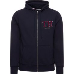 Bluza TOMMY HILFIGER Monogram Zip Through MW0MW11578. Niebieskie bluzy męskie TOMMY HILFIGER, m, bez wzorów, z bawełny, bez kołnierzyka, bez rękawów, bez kaptura. W wyprzedaży za 329,00 zł.