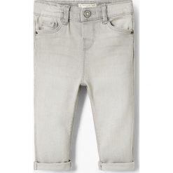 Mango Kids - Jeansy dziecięce Elenag 86-104 cm. Niebieskie rurki dziewczęce marki Mango Kids, z aplikacjami, z bawełny. Za 59,90 zł.