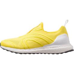 Adidas by Stella McCartney ULTRA BOOST UNCAGED Obuwie do biegania treningowe vivid yellow/footwear white/night steel. Żółte buty damskie do biegania marki adidas by Stella McCartney, z tworzywa sztucznego. W wyprzedaży za 678,30 zł.