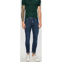 Tommy Hilfiger - Jeansy Bleecker. Niebieskie jeansy męskie TOMMY HILFIGER, bez wzorów, z obniżonym stanem. Za 499,90 zł.