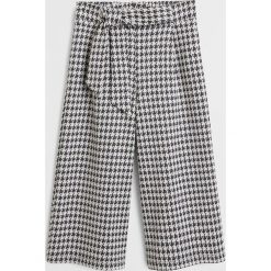 Mango Kids - Spodnie dziecięce Pata 110-164 cm. Szare spodnie dziewczęce Mango Kids, bez wzorów, z elastanu. W wyprzedaży za 59,90 zł.