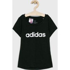 Adidas - T-shirt dziecięcy 128-170 cm. Czarne bluzki dziewczęce Adidas, z nadrukiem, z bawełny, z okrągłym kołnierzem, bez rękawów, bez kaptura. W wyprzedaży za 49,90 zł.