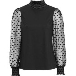 Cellbes Bluzka z rękawami z siateczki Czarny female czarny 34/36. Czarne bluzki damskie Cellbes, bez wzorów, z dżerseju, eleganckie, bez kołnierzyka, bez rękawów. Za 139,00 zł.
