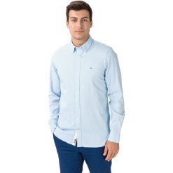 Tommy Hilfiger Koszula Niebieski. Niebieskie koszule męskie TOMMY HILFIGER, s, bez wzorów, z elastanu, bez kołnierzyka, z długim rękawem. Za 428,95 zł.