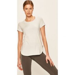 Columbia - T-shirt. Pomarańczowe bluzki damskie Columbia, s, z nadrukiem, z bawełny, casualowe, z okrągłym kołnierzem, z krótkim rękawem. W wyprzedaży za 119,90 zł.