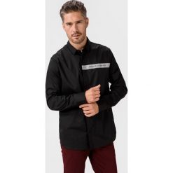 Armani Exchange Koszula Czarny. Czarne koszule męskie Armani Exchange, xxl, bez wzorów, z elastanu, bez kołnierzyka, z długim rękawem. Za 357,95 zł.