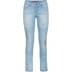 Dżinsy SKINNY z nadrukiem gwiazd bonprix niebieski bleached. Niebieskie jeansy damskie bonprix, z nadrukiem, z jeansu. Za 59,99 zł.