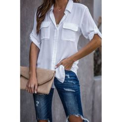 Koszula damska DENILA WHITE. Białe koszule damskie IVET, xl, bez wzorów, eleganckie, bez kołnierzyka, bez rękawów. W wyprzedaży za 49,00 zł.