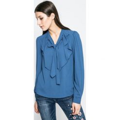 Vero Moda - Bluzka. Niebieskie bluzki damskie Vero Moda, na co dzień, s, bez wzorów, z elastanu, bez kołnierzyka, z długim rękawem. W wyprzedaży za 49,90 zł.
