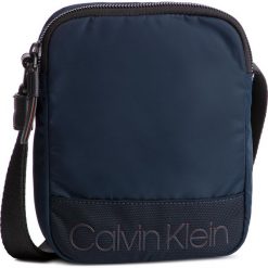 Saszetka CALVIN KLEIN - Shadow Mini Reporter K50K504366 067. Niebieskie torby męskie skórzane Calvin Klein, bez wzorów, z materiału, młodzieżowe. W wyprzedaży za 209,00 zł.
