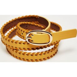 Pasek z ozdobną plecionką. Żółte paski damskie Moodo, w paski. Za 24,99 zł.