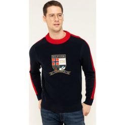 Sweter TOMMY HILFIGER Bold Artwork MW0MW12264. Niebieskie swetry męskie TOMMY HILFIGER, s, bez wzorów, klasyczne, z klasycznym kołnierzykiem, bez kaptura. W wyprzedaży za 359,00 zł.