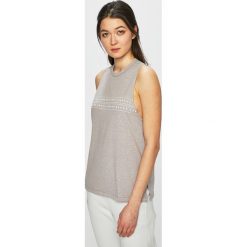 Under Armour - Top. Szare bluzki damskie Under Armour, s, z nadrukiem, z bawełny, z okrągłym kołnierzem. W wyprzedaży za 69,90 zł.