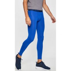 Nike - Spodnie. Niebieskie spodnie męskie Nike, xl, bez wzorów, z elastanu, sportowe. W wyprzedaży za 119,90 zł.