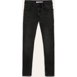 Calvin Klein Jeans - Jeansy dziecięce 128-176 cm. Szare spodnie chłopięce Calvin Klein Jeans, z aplikacjami, z elastanu. Za 299,90 zł.