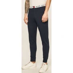 Tommy Hilfiger - Spodnie. Niebieskie spodnie męskie TOMMY HILFIGER, s, bez wzorów, z elastanu. Za 299,90 zł.