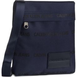 Saszetka CALVIN KLEIN JEANS - Sp Essential Micro Flatpack K50K504962 CG7. Niebieskie torby męskie skórzane Calvin Klein Jeans, bez wzorów, z jeansu, młodzieżowe. W wyprzedaży za 159,00 zł.