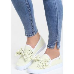 Żółte Slip On Trip to Mars. Żółte trampki damskie slip on marki Born2be, w kropki, z tkaniny. Za 59,99 zł.