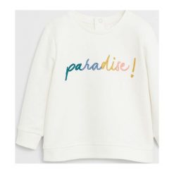 Mango Kids - Bluza dziecięca Paradise 80-104 cm. Białe bluzy dziewczęce Mango Kids, z aplikacjami, z bawełny, bez rękawów, bez kaptura. W wyprzedaży za 49,90 zł.