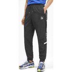 Puma XTG Spodnie dresowe Czarny. Czarne spodnie męskie Puma, m, bez wzorów, z dresówki. Za 326,95 zł.