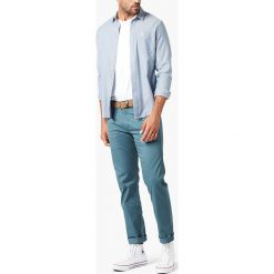 Spodnie chino - Slim fit - w kolorze niebieskim. Niebieskie spodnie męskie DOCKERS, m, w paski. W wyprzedaży za 156,95 zł.