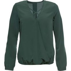 Bluzka z efektem założenia kopertowego bonprix zielony wojskowy. Zielone koszulki damskie bonprix, bez wzorów, z materiału, militarne, bez kołnierzyka, bez rękawów. Za 54,99 zł.