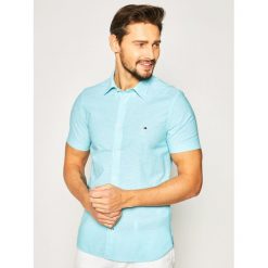 Koszula TOMMY HILFIGER Linen MW0MW12777. Niebieskie koszule męskie TOMMY HILFIGER, s, bez wzorów, z bawełny, casualowe, bez kołnierzyka, bez rękawów. W wyprzedaży za 289,00 zł.