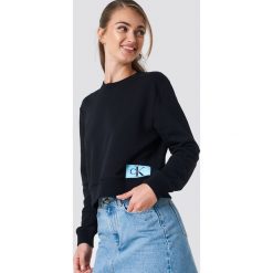 Calvin Klein Bluza Monogram Logo Badge - Black. Czarne bluzy rozpinane damskie Calvin Klein, z aplikacjami. Za 364,95 zł.