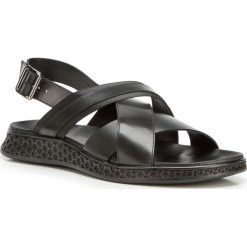 Buty męskie. Czarne kapcie męskie Wittchen, ze skóry, z paskami. Za 399,90 zł.