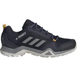 Czarne Buty adidas Terrex AX3 Gtx czarny M G26577. Czarne buty sportowe męskie Adidas, z materiału, na sznurówki, wspinaczkowe, adidas terrex, gore-tex. W wyprzedaży za 529,00 zł.