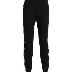 Rue de Femme MARTINA PANT Spodnie treningowe black. Czarne spodnie sportowe damskie marki Rue de Femme, m, z dresówki. Za 419,00 zł.