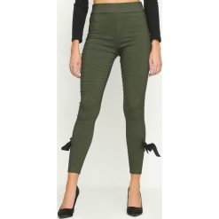 Spodnie damskie: Ciemnozielone Legginsy Linking