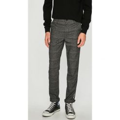 Jack & Jones - Spodnie. Szare rurki męskie marki Jack & Jones, z elastanu. W wyprzedaży za 129,90 zł.