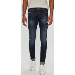 Diesel - Jeansy. Niebieskie jeansy męskie Diesel, z aplikacjami. Za 649,90 zł.
