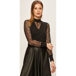 Morgan - Bluzka. Czarne bluzki damskie Morgan, s, w koronkowe wzory, z elastanu, z okrągłym kołnierzem. W wyprzedaży za 139,90 zł.