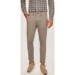 Calvin Klein Jeans - Spodnie. Szare spodnie męskie Calvin Klein Jeans, na co dzień, s, bez wzorów, z elastanu, casualowe. W wyprzedaży za 299,90 zł.
