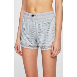 Reebok - Szorty. Szare spodenki sportowe damskie Reebok, s, bez wzorów, z poliesteru, sportowe. W wyprzedaży za 99,90 zł.