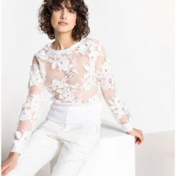 Bluza z koronką. Czarne kardigany damskie marki MADEMOISELLE R, l, w koronkowe wzory, z koronki, z długim rękawem, długie. Za 180,56 zł.