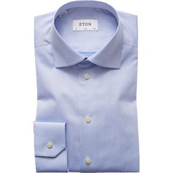 Koszula Eton 300079511. Niebieskie koszule męskie Eton, m, bez wzorów, z bawełny, biznesowe, bez kołnierzyka, bez rękawów. W wyprzedaży za 359,00 zł.