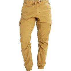 INDICODE JEANS LEWY Bojówki amber. Brązowe jeansy męskie marki INDICODE JEANS, z bawełny. Za 149,00 zł.